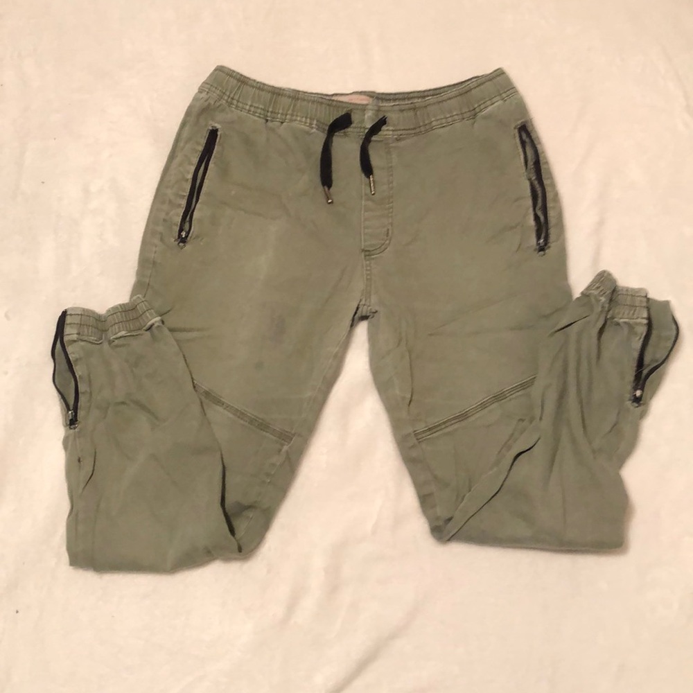 Green joggers, zippered on both ends of legs